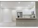 Bright kitchen showcases stainless steel appliances, granite countertops, and ample cabinet space at 102 Neal Ave, Stockbridge, GA 30281