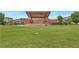 Community amphitheater with a large lawn area and views of the stage for various events at 1125 Lewis Ridge Cir, Lawrenceville, GA 30045
