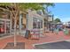 Charming bookstore exterior featuring large display windows, a sidewalk book rack, and inviting outdoor seating at 1125 Lewis Ridge Cir, Lawrenceville, GA 30045