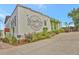 Slow Pour Brewing Company's building with mural and landscaping, offers a vibrant and inviting atmosphere at 1125 Lewis Ridge Cir, Lawrenceville, GA 30045