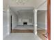 Elegant home foyer with tile flooring, decorative pillars, and an open view to the living space at 1125 Lewis Ridge Cir, Lawrenceville, GA 30045