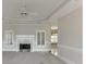 Inviting living room featuring a fireplace and plantation shutters at 1125 Lewis Ridge Cir, Lawrenceville, GA 30045