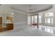 Spacious living room with hardwood floors, chandelier, and natural light at 1125 Lewis Ridge Cir, Lawrenceville, GA 30045