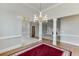 Open-concept living and dining areas adorned with pillars and beautiful decor at 1125 Lewis Ridge Cir, Lawrenceville, GA 30045