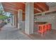 Outdoor bar area with brick columns, wooden ceiling, and comfortable seating, perfect for enjoying drinks at 1125 Lewis Ridge Cir, Lawrenceville, GA 30045