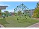 Modern geometric climbing structure and colorful play equipment in the community playground at 1125 Lewis Ridge Cir, Lawrenceville, GA 30045