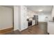 Updated kitchen with white cabinets, stainless appliances, and modern flooring at 1671 Drayton Woods Dr, Tucker, GA 30084