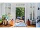 Living area with doors opening to balcony with wooded view at 2380 Crescent Park Ct # 4, Atlanta, GA 30339