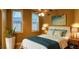 Bedroom with natural light, ceiling fan, wood floors, and a comfy bed at 2380 Crescent Park Ct # 4, Atlanta, GA 30339