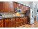 Kitchen features stainless steel appliances and rich, dark wood cabinetry at 2380 Crescent Park Ct # 4, Atlanta, GA 30339