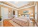 Lovely bedroom showcasing a tray ceiling with access to the luxurious main bathroom at 2380 Crescent Park Ct # 4, Atlanta, GA 30339