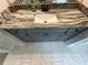 Contemporary bathroom vanity featuring marble countertop and dark cabinets at 442 Snow Owl Way, Lawrenceville, GA 30044