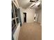 Bright bedroom featuring a ceiling fan, neutral walls and carpet, and a window with curtains at 442 Snow Owl Way, Lawrenceville, GA 30044