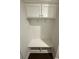 Mud room with a bench, storage cabinets, and hooks for hanging items at 442 Snow Owl Way, Lawrenceville, GA 30044