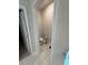 Cozy powder room with toilet and a small pedestal sink at 442 Snow Owl Way, Lawrenceville, GA 30044