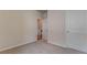 Neutral bedroom featuring carpeting and a white door at 105 Silver Trce, Dallas, GA 30157
