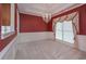 Formal dining room with elegant chandelier, detailed trim work, and abundant natural light at 1239 Brentwood Ct, Douglasville, GA 30135