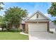 Beautiful brick home with a two-car garage, lovely landscaping, and a well-manicured lawn at 1239 Brentwood Ct, Douglasville, GA 30135