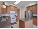 Traditional kitchen with stainless steel appliances, granite countertops and a center island at 1239 Brentwood Ct, Douglasville, GA 30135