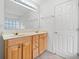Bathroom vanity with double sinks, cabinets, and a large mirror at 3609 Indigo Creek Nw Trl, Kennesaw, GA 30144