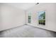 Inviting bedroom with neutral walls, carpet, and windows, offering a serene space to unwind and recharge at 3609 Indigo Creek Nw Trl, Kennesaw, GA 30144