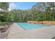 Large community pool with plenty of seating and shade, creating a perfect spot for relaxation and recreation at 3609 Indigo Creek Nw Trl, Kennesaw, GA 30144