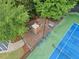 A safe and fun playground area with a slide, climbing structure, benches, and protective mulch ground cover at 3609 Indigo Creek Nw Trl, Kennesaw, GA 30144