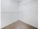 Walk-in closet with neutral walls and wire shelving units installed at 3609 Indigo Creek Nw Trl, Kennesaw, GA 30144