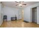 Bright bedroom with hardwood floors, a ceiling fan, a double closet and a neutral color palette at 493 Whaleys Lake Dr, Jonesboro, GA 30238