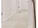 Bright hallway features tile flooring, clean lines, and modern design, creating an inviting space at 1179 Blue Juniper Cir, Loganville, GA 30052
