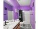 Bathroom featuring colorful walls and a shower-tub combo with patterned floors at 1239 Grampian Pass # 11, Marietta, GA 30008