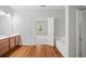 Dual-entry bathroom featuring a large vanity, soaking tub, and separate shower at 1239 Grampian Pass # 11, Marietta, GA 30008