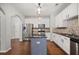 Contemporary kitchen with an island, granite countertops, and stainless steel appliances at 1239 Grampian Pass # 11, Marietta, GA 30008