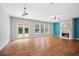 Inviting living room with a modern fireplace, hardwood floors, and natural light at 1239 Grampian Pass # 11, Marietta, GA 30008