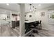 View of basement wet bar with seating, wine cooler, and bar area for entertaining guests at 220 Webley Ln, Alpharetta, GA 30022