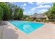 Community pool with sun loungers and a pool house offering a great place to relax and socialize at 220 Webley Ln, Alpharetta, GA 30022