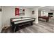 Finished basement with air hockey table and pool table for entertainment at 220 Webley Ln, Alpharetta, GA 30022