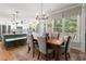 Stylish eat-in kitchen with stainless steel appliances, breakfast bar, and access to the backyard at 220 Webley Ln, Alpharetta, GA 30022