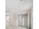 A spacious bedroom with neutral walls, ample closet space, and natural lighting at 127 Roe Hampton Ln Ln, Stone Mountain, GA 30087