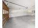 Large garage with ample space and a door, offering convenience and storage solutions for homeowners at 127 Roe Hampton Ln Ln, Stone Mountain, GA 30087