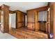 Hallway with wood paneled walls leads to other rooms at 127 Roe Hampton Ln Ln, Stone Mountain, GA 30087