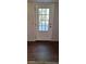 Backdoor features a glass window and an exterior view of the backyard at 2289 Addison Rd, Marietta, GA 30066