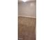 Basement features a carpeted floor, lighting fixtures, and freshly painted white walls at 2289 Addison Rd, Marietta, GA 30066