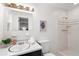 Bright bathroom with tiled shower and updated fixtures at 3131 Garden Lane Dr, Marietta, GA 30062