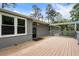 The outdoor deck is ready for entertaining, complete with railings and a stylish wood surface at 3131 Garden Lane Dr, Marietta, GA 30062
