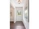 Bright entryway featuring hardwood floors and a stylish front door at 3131 Garden Lane Dr, Marietta, GA 30062