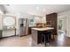 Bright eat-in kitchen offers stainless appliances, island with seating, and plenty of storage at 3131 Garden Lane Dr, Marietta, GA 30062