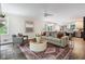 Inviting living space with hardwood floors, neutral furniture, and lots of natural light at 3131 Garden Lane Dr, Marietta, GA 30062