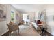 Well-appointed living room with neutral colors, a stylish rug, and natural light at 3131 Garden Lane Dr, Marietta, GA 30062