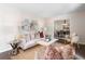 Comfortable living room with stylish furnishings, and an open view to the dining area at 3131 Garden Lane Dr, Marietta, GA 30062